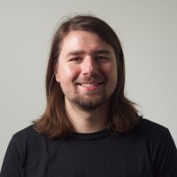 Headshot of René Henrich, a young developer-type guy.