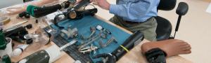 Multiple prosthetic devices on work bench